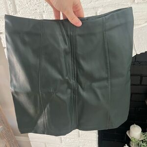 Green leather mini skirt
